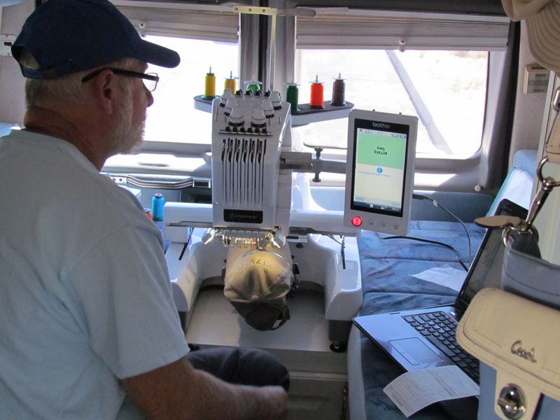 Brent Haberer manning the Brother 6 needle embroidery machine at a Hamfest